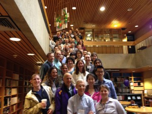 Group photo of math stat faculty and alumni on stairs of science center